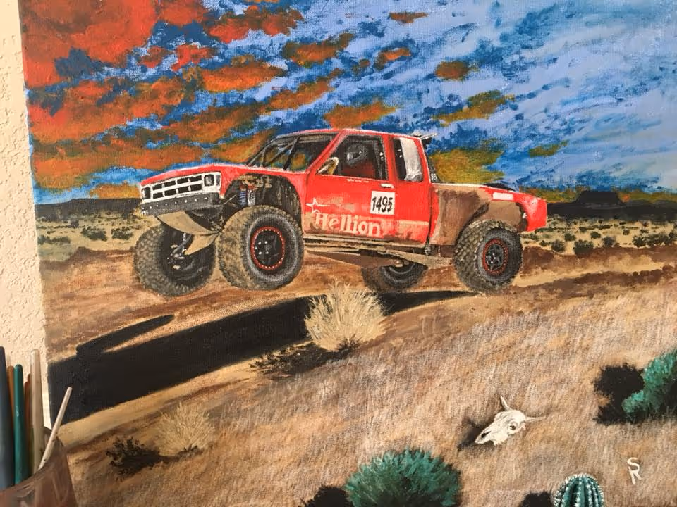 Acrylic painting of a red off-road race truck with 'Hellion' livery, number 1495, catching air over a desert rise under a dramatic red-and-blue sky, a cattle skull in the brush.
